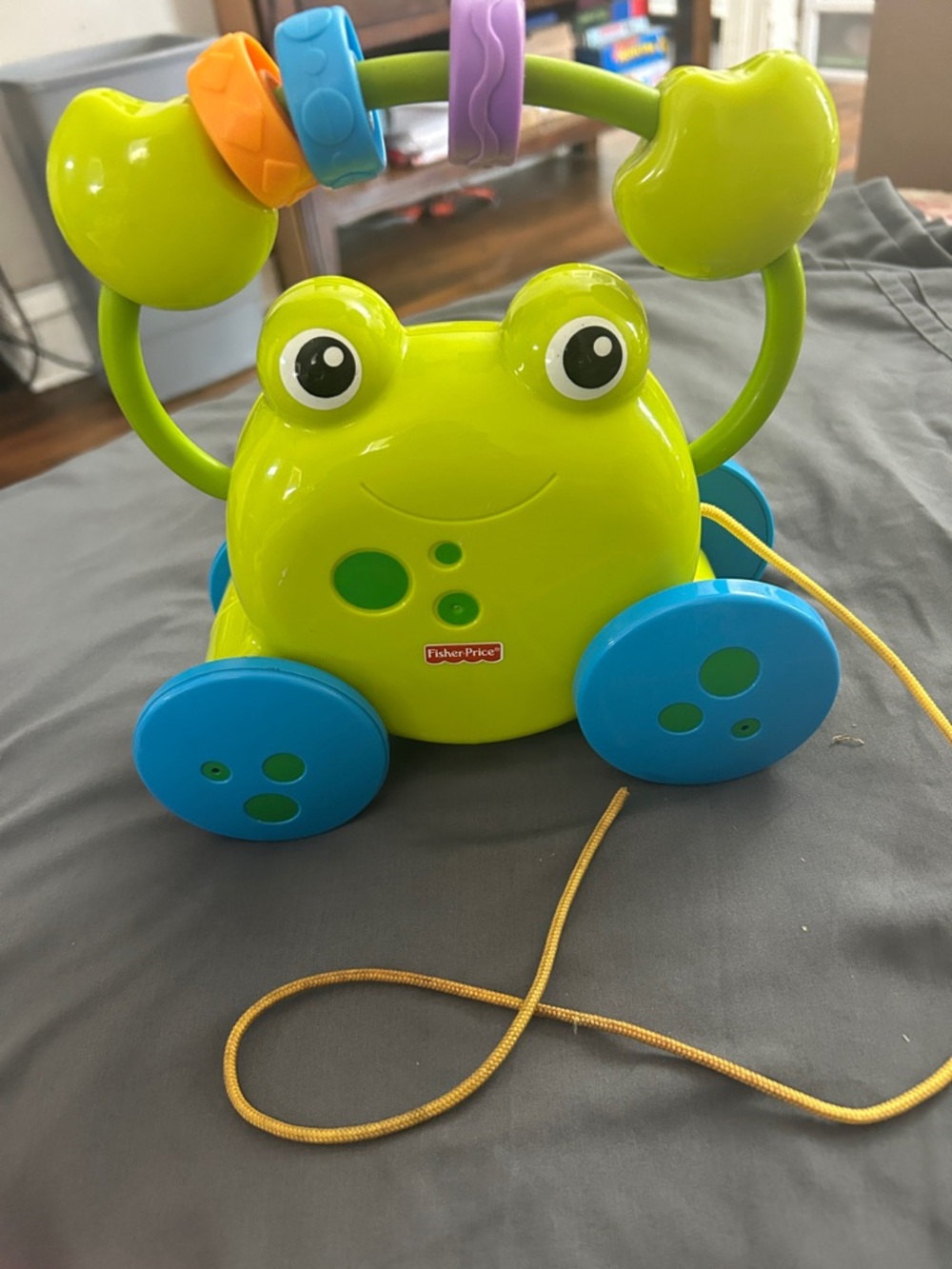 Fisher-Price Lime Green Frog Pull-Along with Blue Wheels and Bead Arch